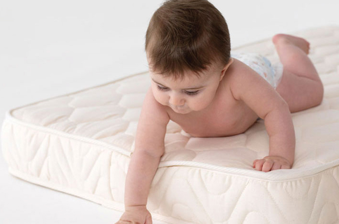 baby bed attached to mattress